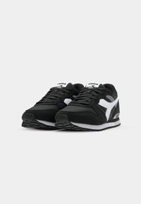 Black athletic shoes with a white side accent, mesh and synthetic upper, rubber sole, rounded toe, and padded collar.
