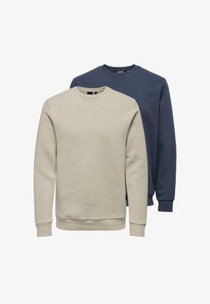 Zwei schlichte Sweatshirts mit Rundhalsausschnitt, eines beige vorne und eines dunkelblau hinten, beide mit langen Ärmeln sowie gerippten Bündchen und Saum.
