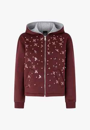 Felpa con zip color bordeaux con interno grigio, caratterizzata da decorazioni floreali con paillettes, due tasche, polsini a costine e cappuccio con coulisse.