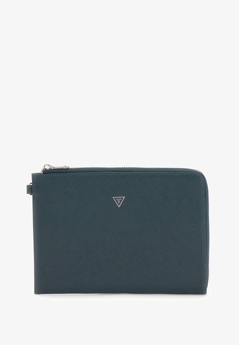 Tumšzils maks ar rāvējslēdzēju, teksturētu virsmu un sudraba trīsstūra logotipa detaļu. Tam ir gluds rāvējslēdzējs un plakana taisnstūrveida forma.