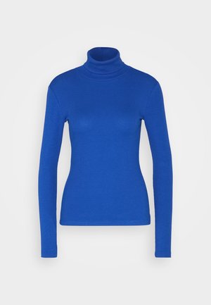 Pull à col roulé côtelé bleu à manches longues, coupe slim et design sans coutures, présenté sur fond blanc.