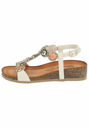 Sandales blanches avec perles et pierres décoratives, semelle en liège, bouts ouverts, bride de cheville réglable et semelle texturée pour plus de confort.