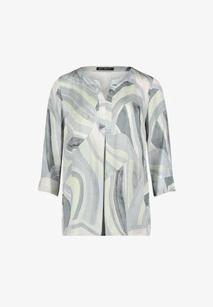 Langärmlige Bluse mit weichen, abstrakten, geschwungenen Streifen in Grün, Grau und Weiß sowie einem geteilten V-Ausschnitt.