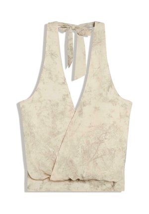 Bež brezrokavnik z zavihkom, kratkim krojem, s subtilnim cvetličnim vzorcem in zavezovanjem okoli vratu na trak.