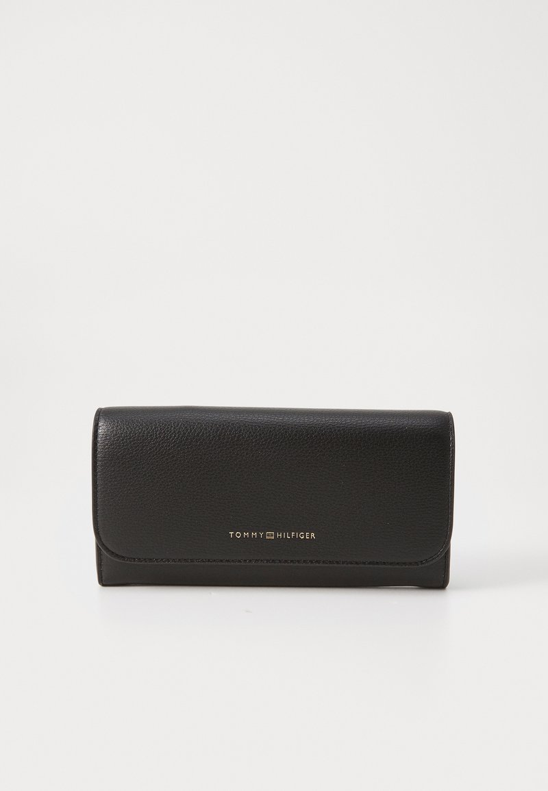 Black leather wallet with a textured finish, featuring a gold logo. The design is rectangular with a flap closure.