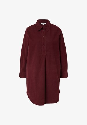 Burgunderfarbenes Hemdkleid aus Cord, mit Kragen, durchgehender Knopfleiste, langen Ärmeln und abgerundetem Saum.