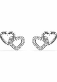 Silver heart-shaped earrings with a double design, one heart outlined and the other filled with sparkling clear crystals.
