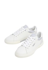 White athletic shoes with smooth synthetic upper, contrasting grey accents, round toe, lace-up closure, and textured rubber sole.