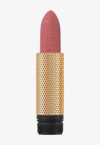 Rouge à lèvres d'une teinte rose mate, présenté dans un tube doré à motif en diamant avec une base noire et un mécanisme à vis pour l'application.