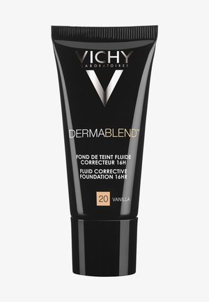 Black plastic tube with a glossy finish. Features silver text and a prominent 'V' logo. Size and shade indicated as 20 Vanilla.