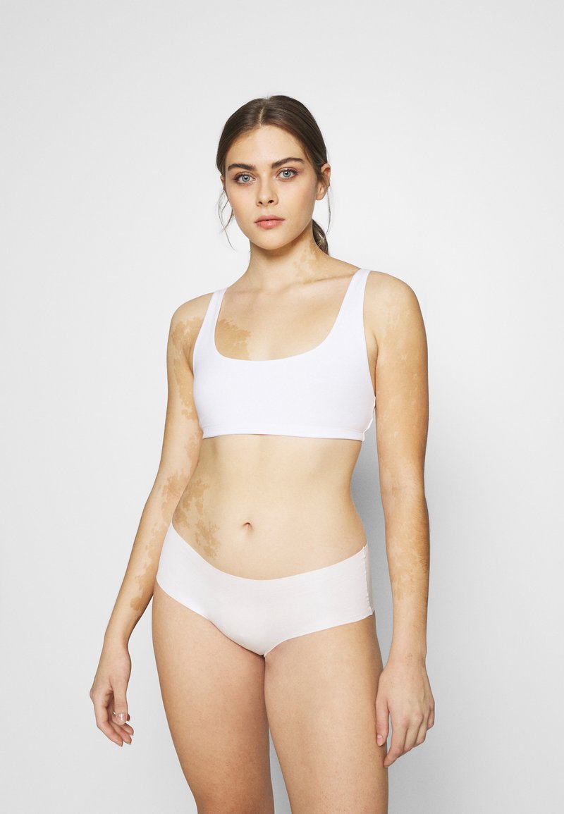 Calida Bustier met spaghettibandjes, model 'Natural Skin Bustier' in