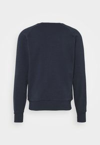 Marinblå sweatshirt med rund hals, långa raglansärmar och ribbade muddar och nederkant. Slät textur, inga synliga mönster eller detaljer.