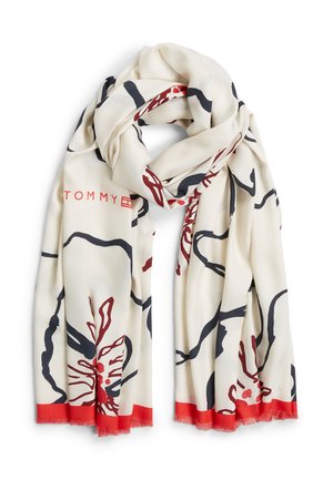 Biały szalik z kwiatowym wzorem w granacie i czerwieni, z jednolitym czerwonym obramowaniem i ozdobnymi frędzlami. Metka marki z napisem "TOMMY" w kolorze czerwonym.