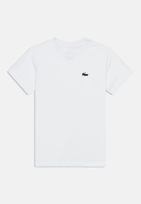 Λευκό κοντομάνικο μπλουζάκι με στρογγυλή λαιμόκοψη και με ένα μικρό κεντημένο λογότυπο πράσινου κροκόδειλου στο αριστερό στήθος.