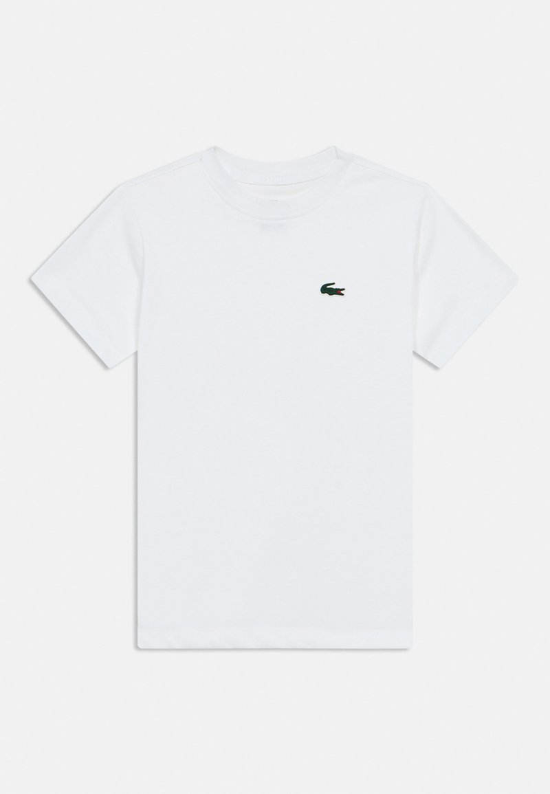 Λευκό κοντομάνικο μπλουζάκι με στρογγυλή λαιμόκοψη και με ένα μικρό κεντημένο λογότυπο πράσινου κροκόδειλου στο αριστερό στήθος.