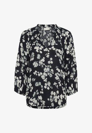 Blusa nera con motivo floreale bianco, caratterizzata da scollo a V, maniche a tre quarti e una vestibilità rilassata in tessuto leggero.