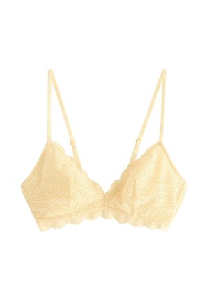 Kremfarvet blonde-bralette med justerbare tynde stropper og bølgekant, designet til let støtte og delikat stil.