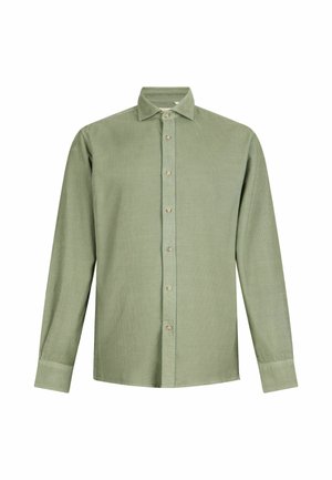 Svetlo zelena bluza s dolgimi rokavi in gumbom na ovratniku, ki ima gumbasto zapiranje in teksturirano tkanino.