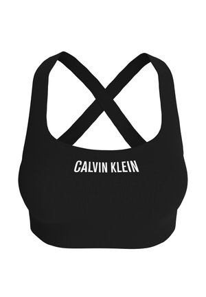 Fekete Calvin Klein sportmelltartó keresztpántokkal a háton és fehér márkajelzéssel elöl, középen.