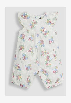 Kratka kombinacija s cvetnim printom v lahkem, teksturiranem materialu. Bela podlaga z rožami v roza, modri in rumeni barvi. Dva sprednja žepa.