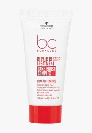 Witte knijptube met rode accenten. De tekst vermeldt "Repair Rescue Treatment," geschikt voor beschadigd haar. Bevat 30 ml.