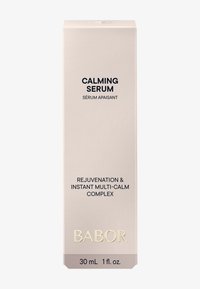 Siero lenitivo Babor in una scatola beige opaco con testo nero. L'etichetta frontale include il nome del prodotto e la descrizione. Formato 30 mL.