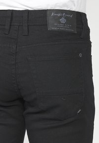 Koroshi STRETCH  - Vaqueros rectos - black