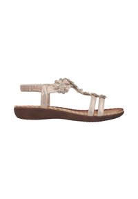 Sandale beige pour femme avec un petit talon compensé marron, bride arrière élastique et décorations florales sur les brides supérieures.