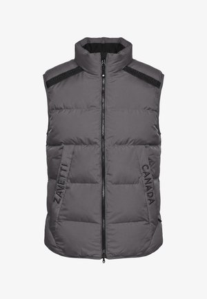 Graue, ärmellose, gepolsterte Weste mit hohem Kragen, Frontreißverschluss, schwarzen Schulterakzenten und dem Schriftzug "ZAVETTI CANADA" auf den vorderen Taschen.