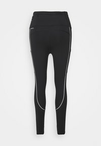 Svarta sportleggings med hög midja, med vit sömnad i sidopanelerna och en diskret bakficka. Slät textur.