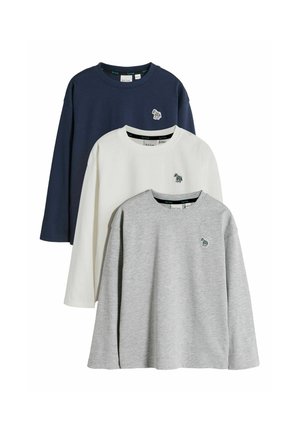 Three long-sleeve crew neck shirts in navy, white, and gray, each with a small embroidered zebra logo on the left chest.