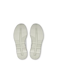 Light gray rubber shoe soles with textured patterns, flex grooves, and a logo prominently displayed in the center.