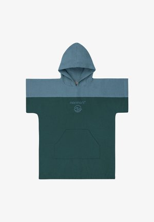 Teal and light blue hooded poncho with textured fabric, featuring a front pocket and logo. Rectangular shape with short sleeves.