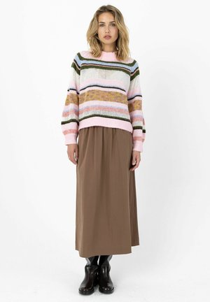 Knit sweater with multi-color stripes, including pink, green, and blue, paired with a brown maxi skirt and black ankle boots.