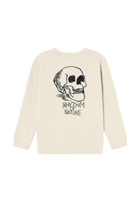 Sweatshirt de couleur crème avec un graphique noir représentant un crâne et le texte "RHYTHM OF NATURE" en dessous. Tissu doux avec une coupe décontractée.