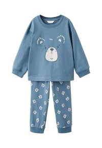 Blå bomullspyjamas i set som har en långärmad topp med ett björnfacedesign och byxor med ett upprepat björn-mönster. Mjuk textur och avslappnad passform.