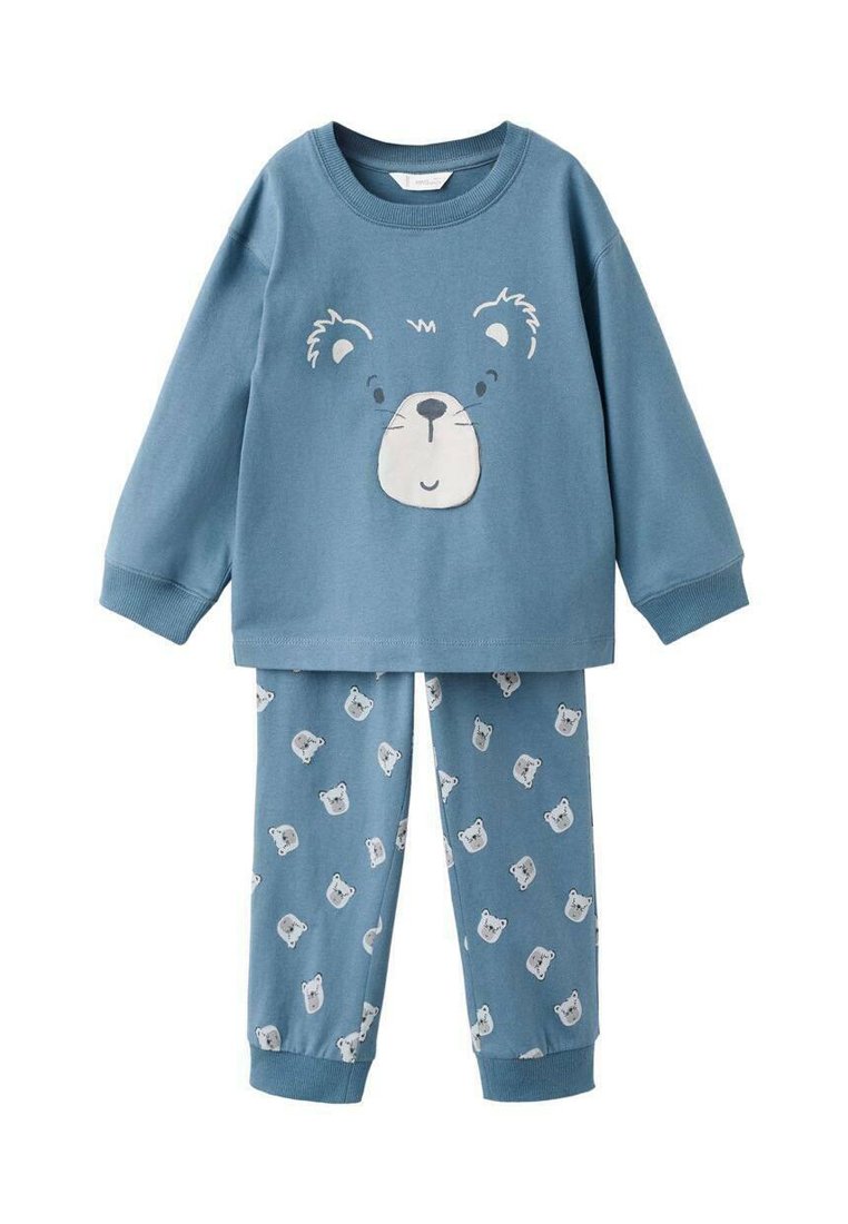 Blå bomullspyjamas i set som har en långärmad topp med ett björnfacedesign och byxor med ett upprepat björn-mönster. Mjuk textur och avslappnad passform.
