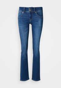 Jeans iz jeansa v temno modri barvi z oprijetim zgornjim delom in razširjenim spodnjim delom. Imajo dvojno zapiranje na gumbe, pet žepov in kontrastne šive.