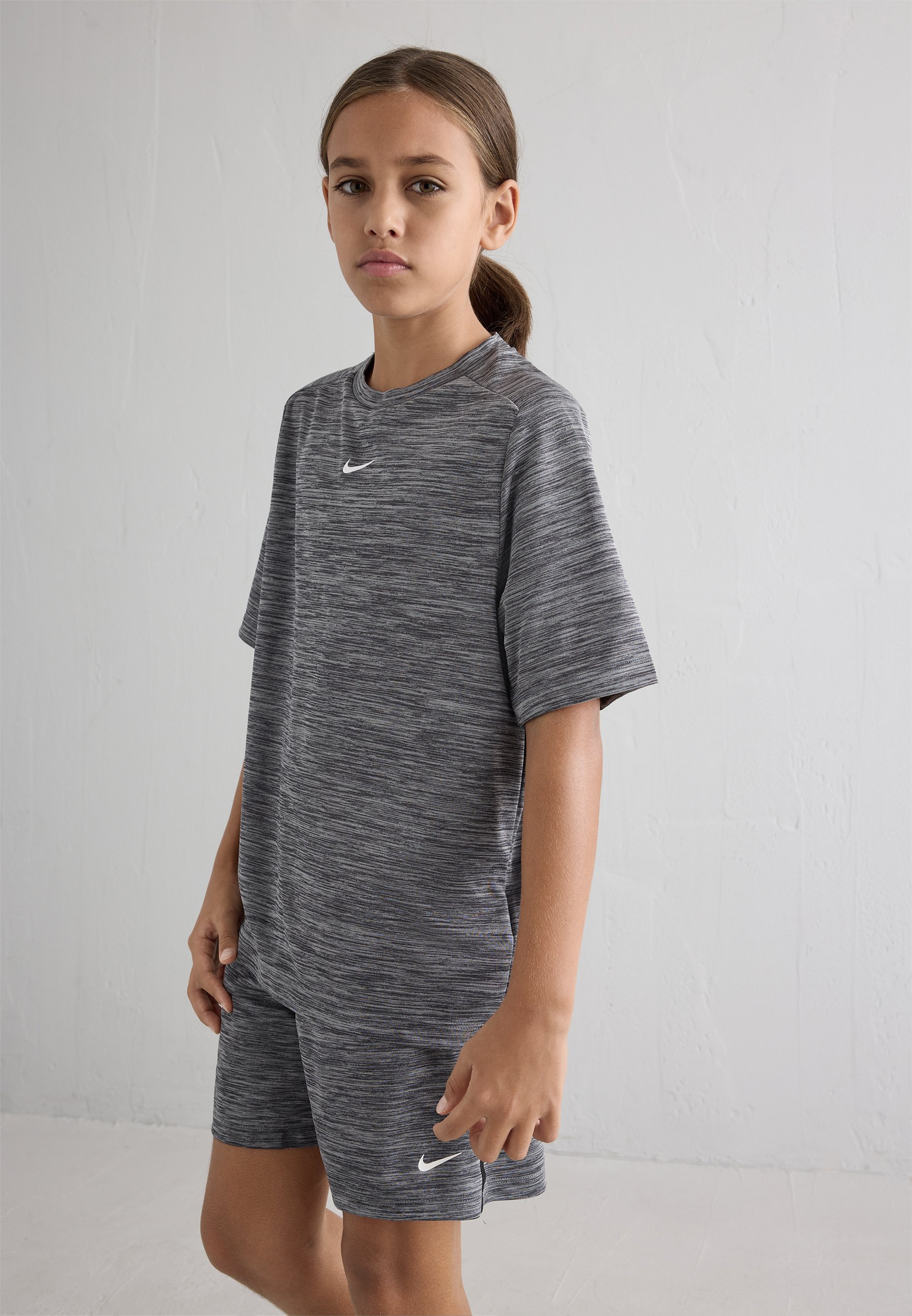 grey and white nike outfit