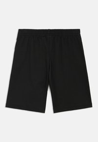 Fekete pamut rövidnadrág rugalmas derékrésszel. Laza szabású, középmagasságú hosszúságú. Sima textúrájú, egyszínű, minták vagy díszítések nélkül.