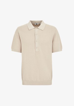 Bežna pletena polo majica s kratkimi rokavi z teksturirano tkanino, štirimi gumbi na zapenjanju in rebrastim robom ter manšetami rokavov.
