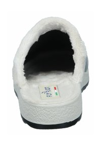 White fur-lined slip-on shoe with a soft, textured upper, padded footbed, and black rubber sole. Features branding on the insole.