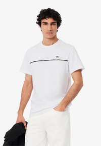 Lacoste Sport - TAPE - T-shirt con stampa - white Immagine in miniatura 1