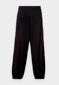 CUFFED MONSTER UNISEX - Tracksuit bottoms - black