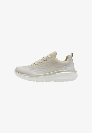 Light beige athletic shoes with a textured mesh upper, subtle wave pattern, and white sole. Features lace-up design and rear pull tab.