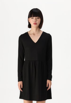 Black long-sleeve dress with a V-neck, fitted bodice, and gathered waistline. Made from soft fabric, it falls above the knees.