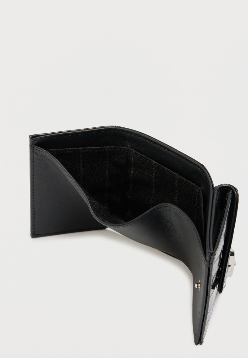 Black leather bifold wallet open, showing multiple card slots and a coin pocket with a metallic clasp on the side.