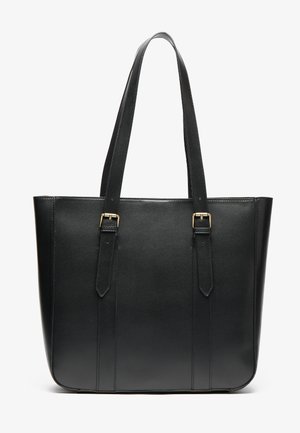 Black leather tote bag with dual straps, rectangular shape, smooth texture, and gold-tone hardware accents. Features vertical seam detailing.