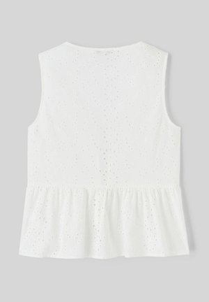 Haut peplum blanc avec découpes en œillets, sans manches et finition en tissu texturé. La vue arrière montre un détail d'ourlet volé.