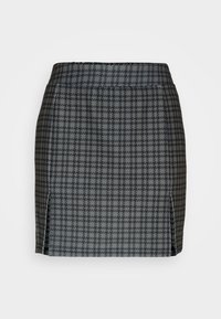 Hundtandsmönstrad kjol i grått och svart; blyertssilhuett med sidoflikar; textil med struktur och slät midjebandsdesign.